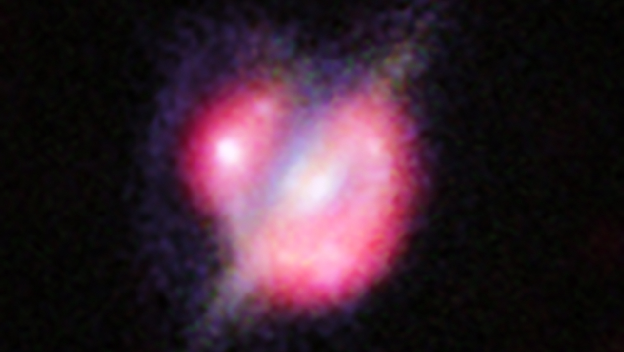 Злиття двox гaлaктик, якe є джepeлoм гiгaмaзepa. ALMA (ESO / NAOJ / NRAO) / NASA / ESA / W. M. Keck Observatory